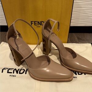 Fendi stacked heels in tope color leather with logo cut out size 40.